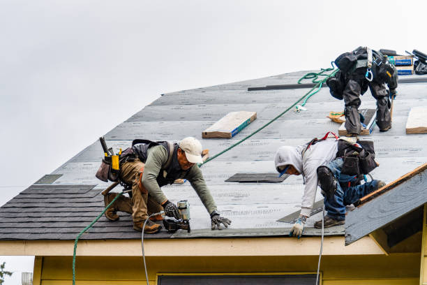 Professional Roofing technician working in West Bridgewater, MA
